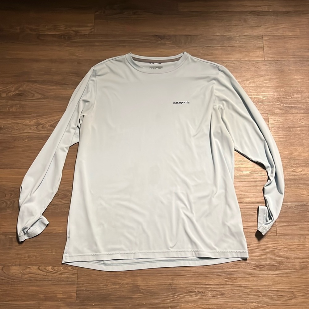 Patagonia long sleeve shirt. Size L. Light blue. Feint stain